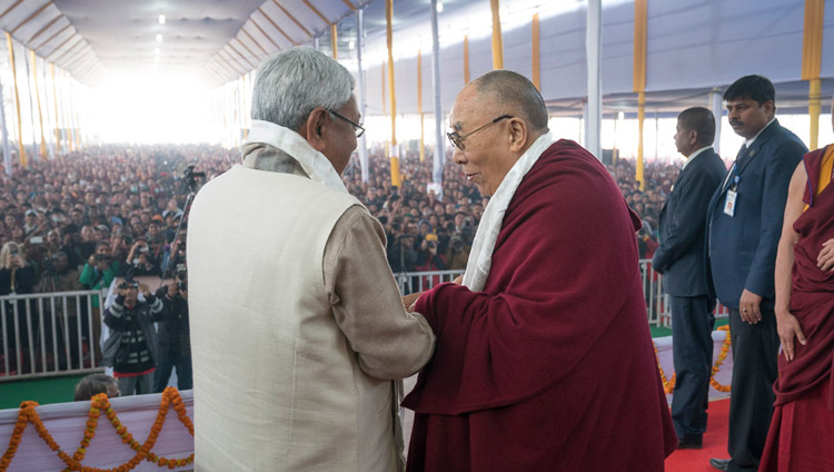 His Holiness the Dalai Lama and Bihar Chief Minister Nitish Kumar exchanging greetings at the start of the book release ceremony in Bodhgaya on January 7, 2018. Photo: OHHDL