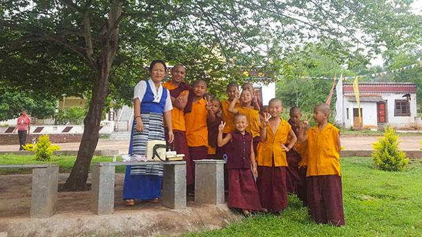 Namkhang Lhamo with young monks at Taksham Monastary in Kollegal, South India. Photo: TPI/Tenzin Tsomo