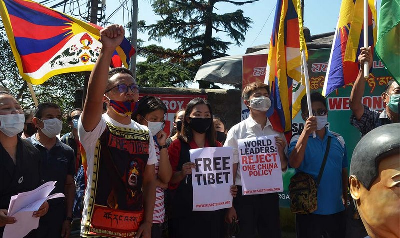 Activists hold a protest march in McLeodganj, Dharamshala, India, on October 1, 2020. Photo: TPI/Yangchen Dolma