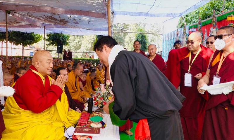 Sikyong greets Khenchen Rigzin Rinpoche at the Monlam festival in Bodh Gaya.