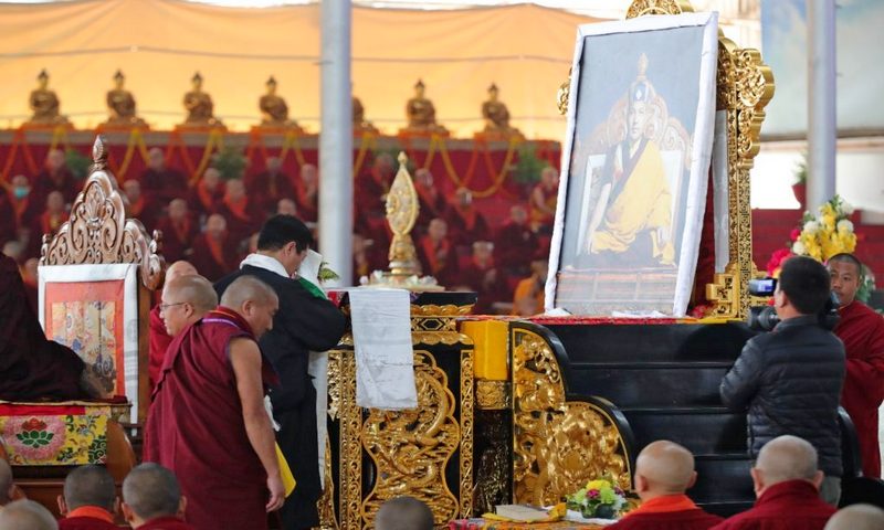 Sikyong Dr Lobsang Sangay pays obeisance as he greets to the portrait of Gyalwa Karmapa at the 37th Kagyu Monlam Festival in Bodh Gaya.