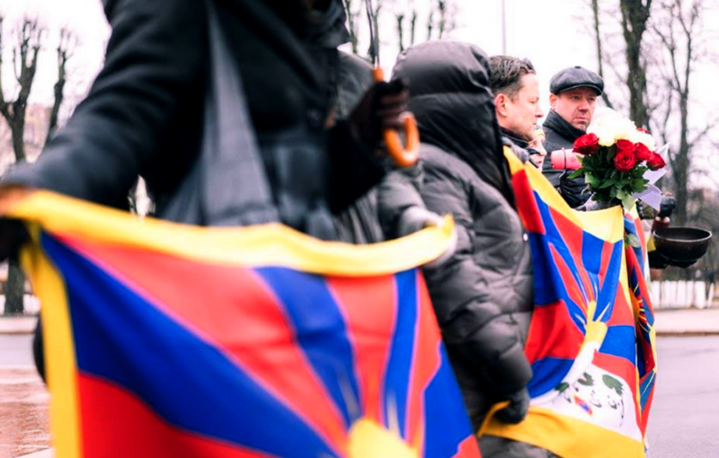 Tibet supporters in Bulgaria holding the Tibetan flag. Photo: Tibet Bureau Geneva