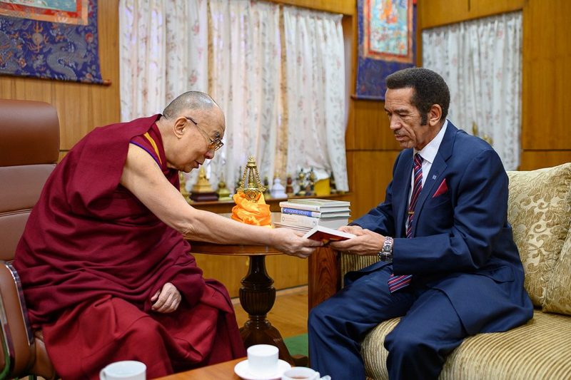 His Holiness presenting former President of Botswana Ian Khama with one of his books during their meeting at his residence in Dharamsala, HP, India on March 10, 2019. Photo by Tenzin Choejor