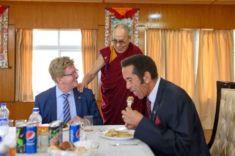 His Holiness checking on how Member of the European Parliament Thomas Mann is enjoying the lunch at his residence in Dharamsala, HP, India on March 10, 2019. Photo by Tenzin Choejor